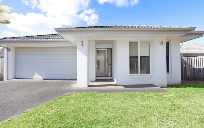 Front photo house with garage and lawn