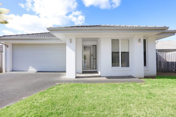 Front photo house with garage and lawn